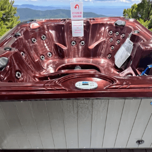 Outdoor hot tub with scenic mountain view.