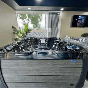 Modern indoor hot tub with control panel.